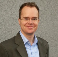 Dr David Grumett